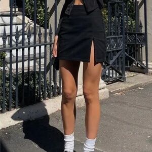 Lioness Black Mini Skirt Sleek Design Denim Side Slit Revolve Brand XXS